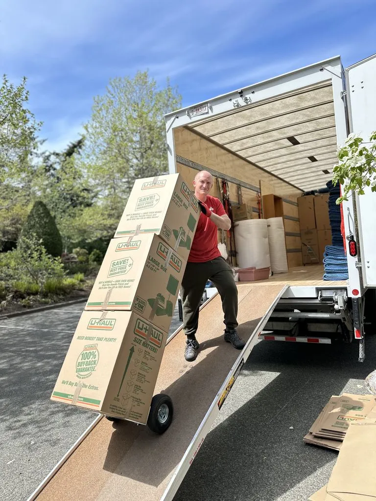 Best Moves team packing kitchenware and electronics for a home move